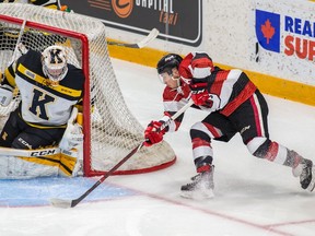 67's centre Sasha Chmelevski can't sneak the puck past Frontenacs netminder  Jeremy Helvig on this scoring opportunity during Saturday's game. Valerie Wutti/Blitzen Photography/OSEG