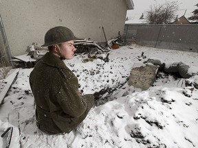 Student Dylan Ferris is spend 24 hours in a replica of a First World War trench he has built in his backyard on Tuesday, March 27, 2018 in Edmonton.