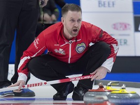 Team Canada skip Brad Gushue directs the sweep as they play Manitoba in the eight-team championship round at the Tim Hortons Brier at the Brandt Centre in Regina on Thursday, March 8, 2018.