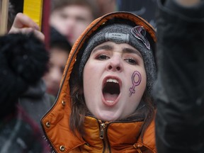 A protester attends a Women's March.