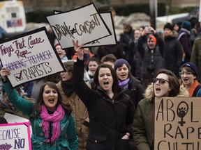 Demonstrators protest Judge Gregory Lenehan's decision to acquit a Halifax taxi driver charged with sexual assault during a rally in Halifax on March 7, 2017.