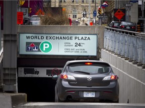 World Exchange Plaza parking signage Sunday, April 8, 2018.   Ashley Fraser/Postmedia