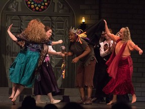 From left to right, Siobhan McMahon performs as esmeralda, Jaebet Joseph performs as Quasimodo, Zoe Lyle-Hayward performs as a gypsy during St. Joseph Catholic High School's cappies rendition of the Hunchback of Notre Dame on April 12, 2018.