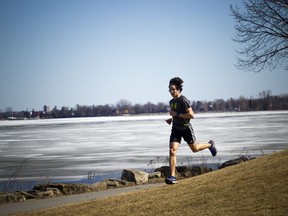 Welcome warmth and sun brought the runners out in Ottawa on Saturday, including this person sprinting through Andrew Haydon Park.