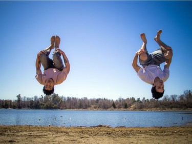 Warmer temperatures hit Ottawa Sunday April 22, 2018 and people were out and about enjoying the sunshine at Mooney's Bay Park. L-R Sheldon Morgan and Brandon Azzie were working on their parkour tricks on the beach Sunday afternoon in the warm sunshine.