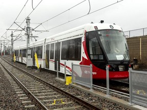 One of Ottawa's new LRT cars in the unfinished Tremblay station.