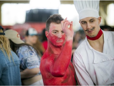 Mathieu Gignac was concentrating very hard while covered in red paint as chef Alex Chevrette looked on.