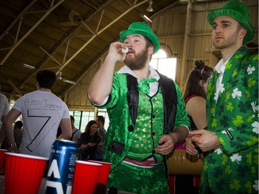 The world's largest costume party beer pong tournament took place at Aberdeen Pavilion at Lansdowne on Saturday, April 28, 2018. Shawn de Guise, left, and Kyle Jessup were all ready for St. Patrick's Day as they took part.