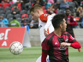 Ottawa Fury FC #10 Gerardo Bruna and Cincinnati FC #16 Richie Ryan battle for the ball during the first half of the game Saturday April 28, 2018 at TD Place.