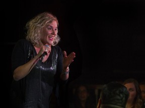 Stand-up comedian Rachelle Elie performing at Absolute Comedy club.