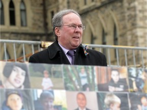 Senator Jim Munson looks on during the First Annual World Autism Awareness Day event held on Parliament Hill March 27, 2013.