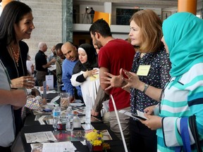 A 2016 job fair at Ottawa City Hall is shown in this file shot. Are you earning what you should?  (JULIE OLIVER/POSTMEDIA)