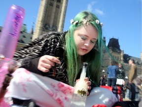 - Angela Rashotte, 21, sits with friends using their bongs on the hill.  It was the annual 4/20 rally on Parliament Hill Friday as hundreds gathered to smoke pot and celebrate cannabis culture.  Organizers of this year's rally say it's a celebration and a protest: a celebration for the forthcoming legalization of pot this summer and a protest of the government's strict regulations surrounding that.  Julie Oliver/Postmedia