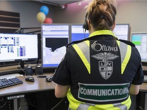 An Ambulance Communications Officer Trainee works in the Ottawa Central Ambulance Communications Centre. April 9,2018. Errol McGihon/Postmedia