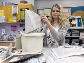 Natalie Perry is a student at Frederick Banting Secondary Alternate Program in Stittsville. The school has been making green bin liners out of recycled Citizen newspapers for years. (Errol McGihon/Postmedia)