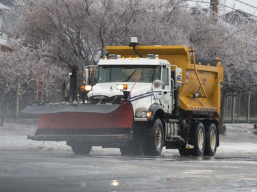 A plough and sand truck in Ottawa during a severe spring storm. April 16,2018. Errol McGihon/Postmedia