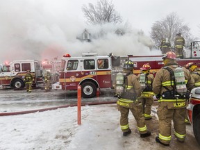 The Ottawa Fire Department battles a blaze on Snowberry Way in Stittsville. April 16,2018. Errol McGihon/Postmedia