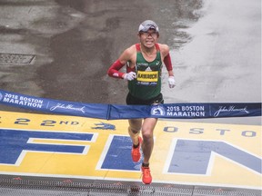 Yuki Kawauchi of Japan crosses the finish line as the winner of the 2018 and 122nd Boston Marathon for Elite Men's race with a time of 2:15:58. on April 16, 2018 in Boston, Massachusetts.