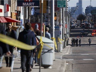 TORONTO, ON - APRIL 23: Police work the scene on Yonge St. at near Finch Ave., after a van plowed into pedestrians on April 23, 2018 in Toronto, Canada.  A suspect identified as Alek Minassian, 25, is in custody after a driver in a white rental van collided with multiple pedestrians killing nine and injuring at least 16.