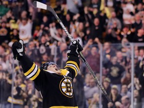 Torey Krug #47 of the Boston Bruins celebrates after scoring a goal against the Toronto Maple Leafs during the third period of Game Seven of the Eastern Conference First Round in the 2018 Stanley Cup play-offs.