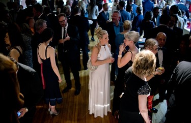 People gather during the cocktail reception.