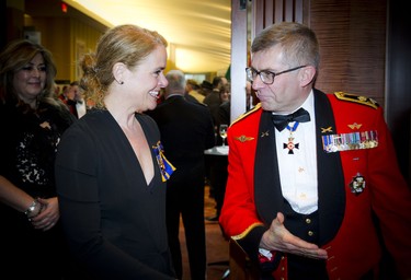 Gov. Gen. Julie Payette was greeted by Lt.-Gen. Paul Wynnyk as she arrived at the VIP reception before the ball.