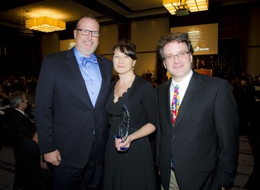 From left, Tim McKee Postmedia media sales consultant with Community Impact Award winners Thea Sommerdyk, Ericsson Canada operations manager, and Chris Spencer, an Ericsson Canada software developer.