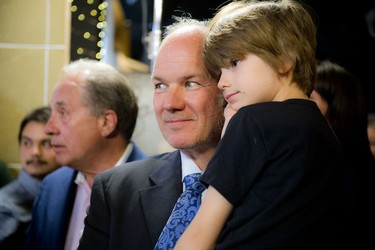 Jeff Mierins, owner of Star Motors, with his son six-year-old Max.
