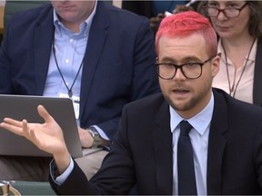 Footage broadcast by the UK Parliamentary Recording Unit (PRU) shows Canadian data analytics expert Christopher Wylie, who worked at Cambridge Analytica, appearing as a witness before the Digital, Culture, Media and Sport Committee of the British parliament on March 27 as part of the committee's investigation into fake news.