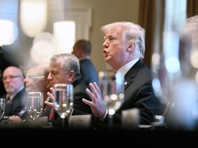 US President Donald Trump hosts a working lunch with the Baltic heads of state on April 3, 2018, in the Cabinet Room of the White House in Washington, DC.