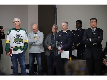 Rob Muench, left, mayor of the City of Humboldt, and others attend a press conference at the Humboldt Uniplex on April 7, 2018.