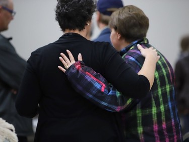 People attend a press conference at the Humboldt Uniplex on April 7, 2018.