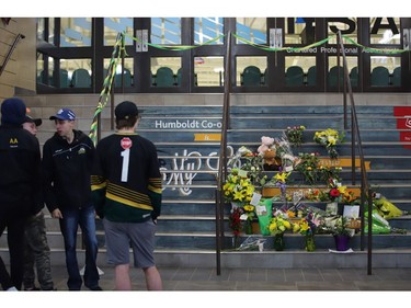 Flowers are left outside the Humboldt Uniplex ice-skating rink.