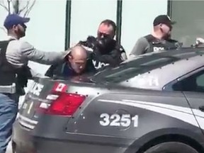 A man has been taken into custody after 8-10 people were struck by a white van along Yonge St. near Finch Ave April 23/2018.