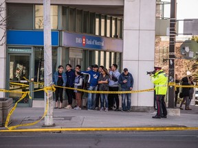 Emergency services close Yonge Street in Toronto after a van mounted a sidewalk crashing into a number of pedestrians on Monday, April 23, 2018.