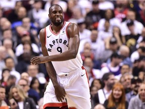 Raptors forward Serge Ibaka (9) reacts during the second half of Satuday's game against the Wizards.