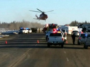 This image provided by 650 CKOM/980 CJME shows emergency crews responding to the scene where a bus carrying a junior hockey team to a playoff game was struck by a semi Friday, April 6, 2018, north of Tisdale, Saskatchewan, Canada.
