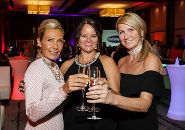 From left, Chantal Lafontaine, Martine Dion and José Line Leduc enjoy a toast.