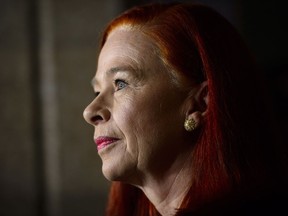 Catherine Tait, looks on as Heritage Minister Melanie Joly announces that Tait is the new president and CEO of CBC/Radio-Canada during a press conference in the foyer of the House of Commons on Parliament Hill in Ottawa on Tuesday, April 3, 2018.