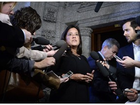 Minister of Justice and Attorney General of Canada Jody Wilson-Raybould speaks to reporters in the Foyer of the House of Commons on Parliament Hill in Ottawa on Monday, Feb. 12, 2018.