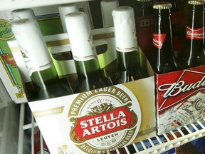 Bottles of Stella Artois beer are seen on display at Dixie Liquors, Monday July 14, 2008, in Washington. Stella Artois today announced a voluntary recall of select packages containing 11.2-ounce (330ml) bottles of Stella Artois beer that may contain particles of glass.