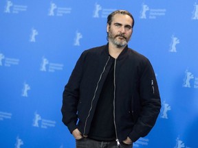 Actor Joaquin Phoenix poses at a photo call for the film 'Don't Worry, He Won't Get Far On Foot', during the 68th edition of the International Film Festival Berlin, Berlinale, in Berlin, Germany, Tuesday, Feb. 20, 2018. Phoenix acts coy when asked about rumours around him possibly playing the Joker in a Batman villain-origin movie.