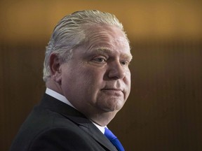 Ontario Conservative leader Doug Ford takes questions from journalists during a pre-budget lock-up as the Ontario Provincial Government prepares to deliver its 2018 Budget at the Queens Park Legislature in Toronto on Wednesday, March 28, 2018.