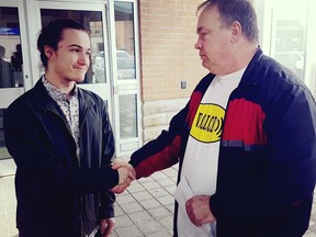 Felix Laframboise, left, and Robert Cadieux shake hands outside the Cornwall courthouse after the appeal of Laframboise's sentence for causing a collision that killed Cadieux's wife. Alan S. Hale/Cornwall Standard-Freeholder/Postmedia Network