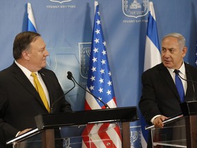 U.S. Secretary of State Mike Pompeo. left. and Israeli Prime Minister Benjamin Netanyahu speak during a a press conference at the Ministry of Defense in Tel Aviv, Sunday, April 29, 2018.