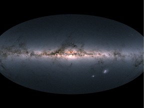 This image provided by the European Space Agency ESA, is Gaia's all-sky view of our Milky Way Galaxy and neighboring galaxies, based on measurements of nearly 1.7 billion stars. The map shows the total brightness and colour of stars observed by the ESA satellite in each portion of the sky between July 2014 and May 2016. (ESA via AP) ORG XMIT: XGA101