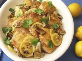 Baked chicken thighs with preserved lemons and artichoke hearts. This dish is from a recipe by Sara Moulton.