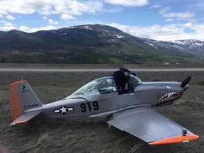 A Mustang II plane sits on the ground after landing between a divided highway near Merritt, B.C. on Sunday, April 22, 2018.