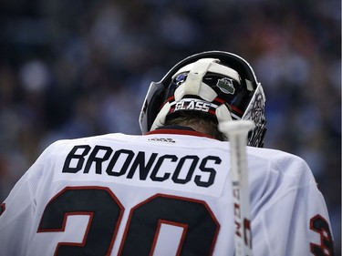 Blackhawks, Jets players wear jerseys with 'Broncos' on the back