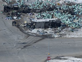 The wreckage of a fatal crash outside of Tisdale, Sask., is seen Saturday, April, 7, 2018. A bus carrying the Humboldt Broncos hockey team crashed into a truck en route to Nipawin for a game Friday night killing 14 and sending over a dozen more to the hospital.